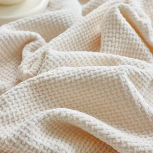 Thick cream waffle knit chenille sofa cover with textured reversible woven fabric pattern