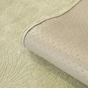 Cuscino divano in ciniglia verde con trama a foglia e retro gommato antiscivolo