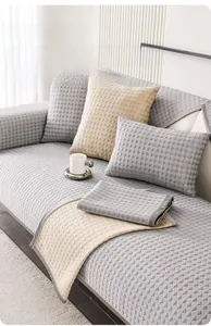 Detailed view of breathable quilted texture on gray cooling summer sofa cushion cover