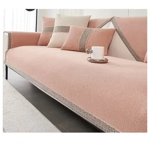 Detail of pink chenille sofa cushion with waffle texture and silver sequin trim