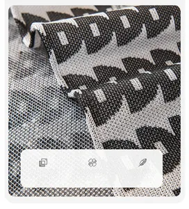 Close-up of durable jacquard woven cooling ice silk sofa cover fabric with geometric patterns