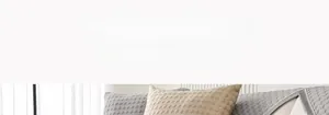 Detail view of grey and beige cooling sofa pads with breathable waffle texture and quilting
