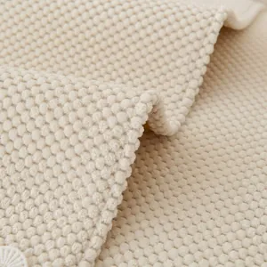 Pluche crèmekleurige bankhoes met popcorntextuur en zachte 3D-textuurstof