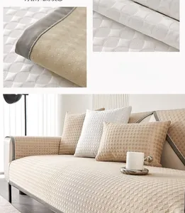 Detail showing non-slip particles on the back of beige quilted cooling sofa mat