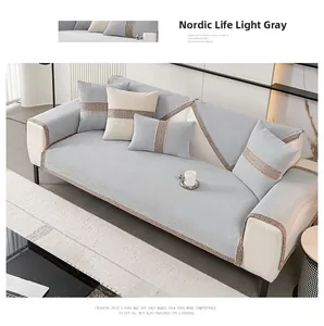 Detail of light gray chenille sofa cushion with exquisite woven stripe edges in Nordic style