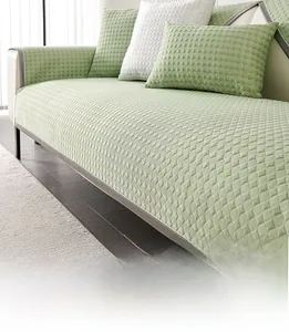 Macro detail of grass green antibacterial fiber sofa cover with diamond quilted texture