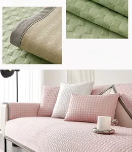 Close-up of non-slip silicone backing and textured quilted fabric on a summer sofa mat