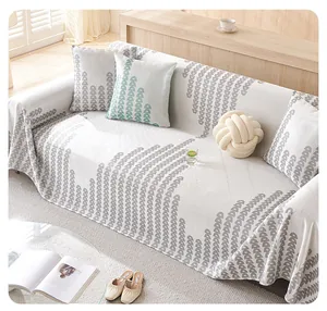 Detail of ice silk sofa cover with geometric pattern and thick knit texture fabric