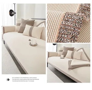 Detail of cream chenille sofa cover showing woven striped texture and soft fabric