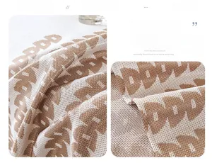 Macro detail of breathable coffee ice silk sofa cover with textured jacquard patterns