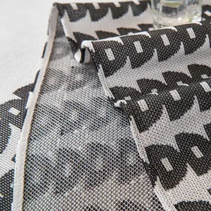 Modern ice silk sofa cover with black and white geometric pattern for summer cooling