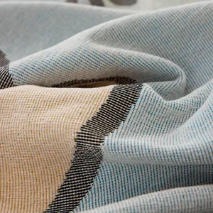 Modern Nordic sofa cover with geometric blue and beige woven texture fabric