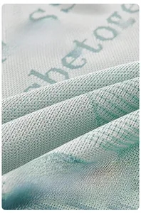 Macro shot of breathable ice silk fabric with cooling fiber honeycomb mesh texture