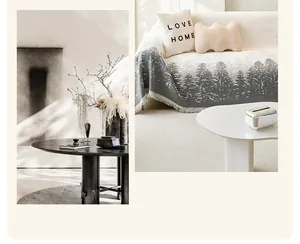 Detail of Nordic forest pattern sofa throw featuring thick jacquard fabric and fringe edges