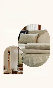 Detail of green floral chenille sofa cover with vintage plant jacquard texture
