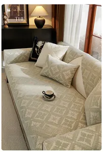 Detail of chenille sofa cushion with green floral jacquard and non-slip texture