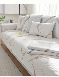 Detail of white ice silk sofa mat featuring a textured honeycomb marble pattern fabric