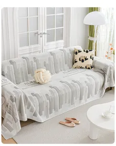 Detailed texture of cool ice silk sofa cover with geometric pattern and text
