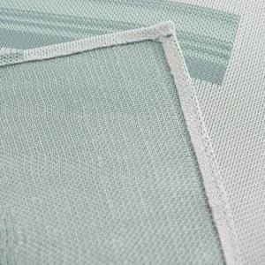 Summer ice silk sofa cover with mint green knit texture and durable stitched edges