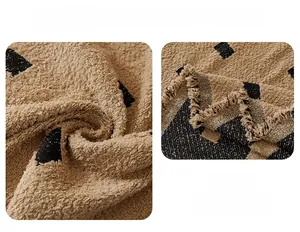 Macro detail of coffee bouclé fabric with black grid pattern and soft texture