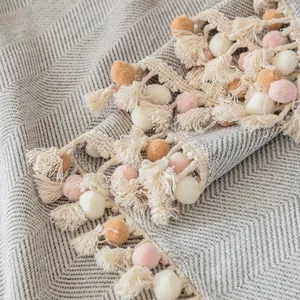 Herringbone chenille sofa throw cover with colorful pompoms and fringe tassels