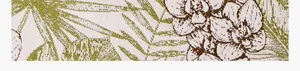 Close-up of tropical palm leaf and floral jacquard pattern on slipcover fabric