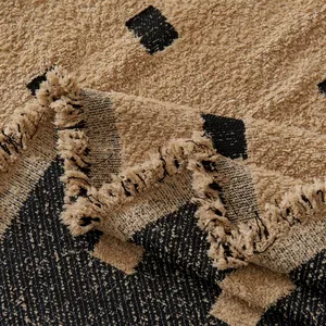 Khaki and black checkered faux fur sofa cover with decorative fringed edges