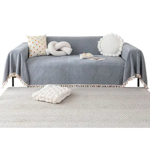 Classic dark grey chenille sofa cover with herringbone weave and fringe tassel trim