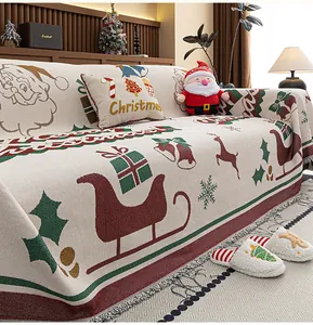 Detail of Christmas chenille sofa cover featuring festive reindeer and snowflake patterns