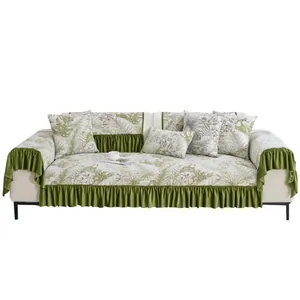 American pastoral sofa cover with green tropical leaf patterns and elegant ruffled edges