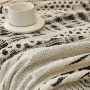 Bohemian style double-sided sofa throw blanket with textured black and white patterns