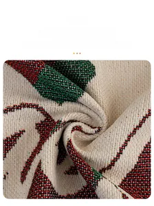 Detailed shot of skin-friendly chenille fabric with festive geometric wave patterns