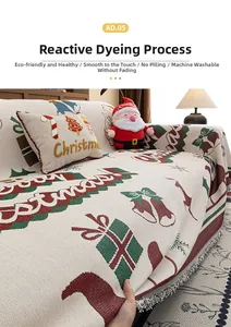Close-up of chenille Christmas sofa cover with holiday patterns and fringe details