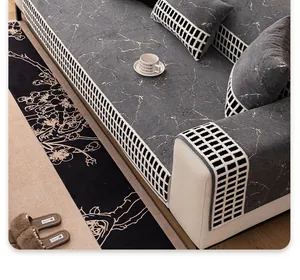 Detail of dark grey marble texture chenille sofa cushion with checkered woven edges