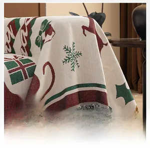 Detailed view of Christmas chenille sofa cover with elk pattern and fringe edge
