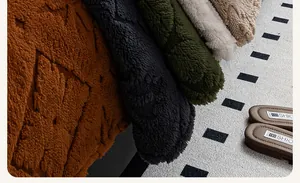 Close-up of thick plush sofa covers with geometric diamond patterns in multiple colors