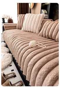 Macro detail of thick faux rabbit fur sofa cover with 3D wavy texture in camel color