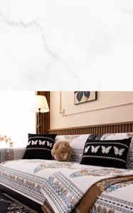 Detail of Chenille sofa cover with classical scroll pattern and butterfly embroidery