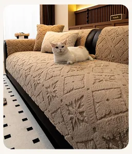 Detailed close-up of brown velvet sofa cover with geometric 3D plush square embroidery