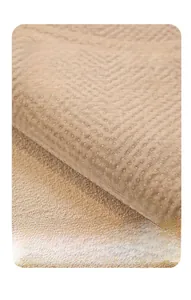 Detailed macro view of silicone anti-slip particles on woven chenille sofa cover fabric