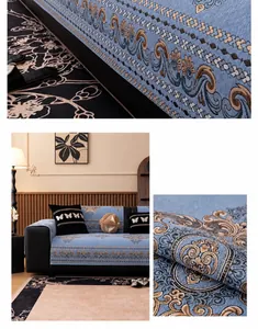 Detailed view of blue chenille sofa cover featuring classic damask leaf patterns