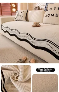 Detail of chenille sofa cover showing creamy white fabric texture and anti-slip backing