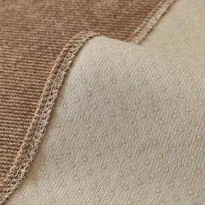 Detailed macro shot of waterproof chenille sofa pad with non-slip silicone backing texture