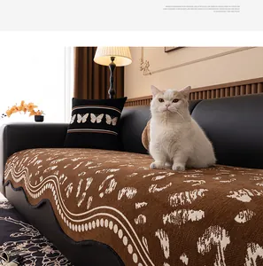 Close-up of thick chenille sofa cushion with brown leopard pattern and wavy edges