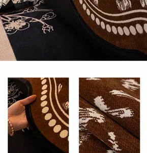 Close-up of thick chenille sofa cushion with brown floral patterns and non-slip texture