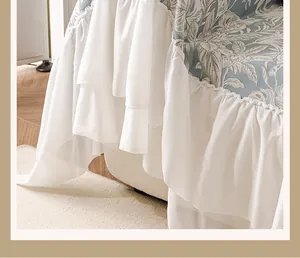 Detailed view of French vintage chenille sofa cover with elegant white ruffle edges