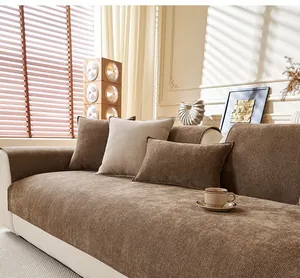 Detail view of thick brown chenille sofa cover with ribbed texture and matching cushions