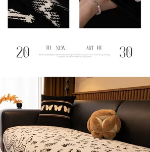 Detail of premium cream chenille sofa cover with black abstract patterns and thick texture