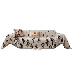 Moderne Chenille kerstbankhoes in wit met zwart Scandinavisch patroon van dennenbomen