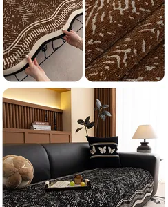 Makroaufnahme von dickem Chenille-Sofa-Stoff mit gestickten Schmetterlingsmustern